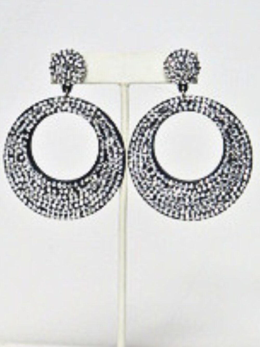 Bold oversized silver-tone open-circle statement earrings